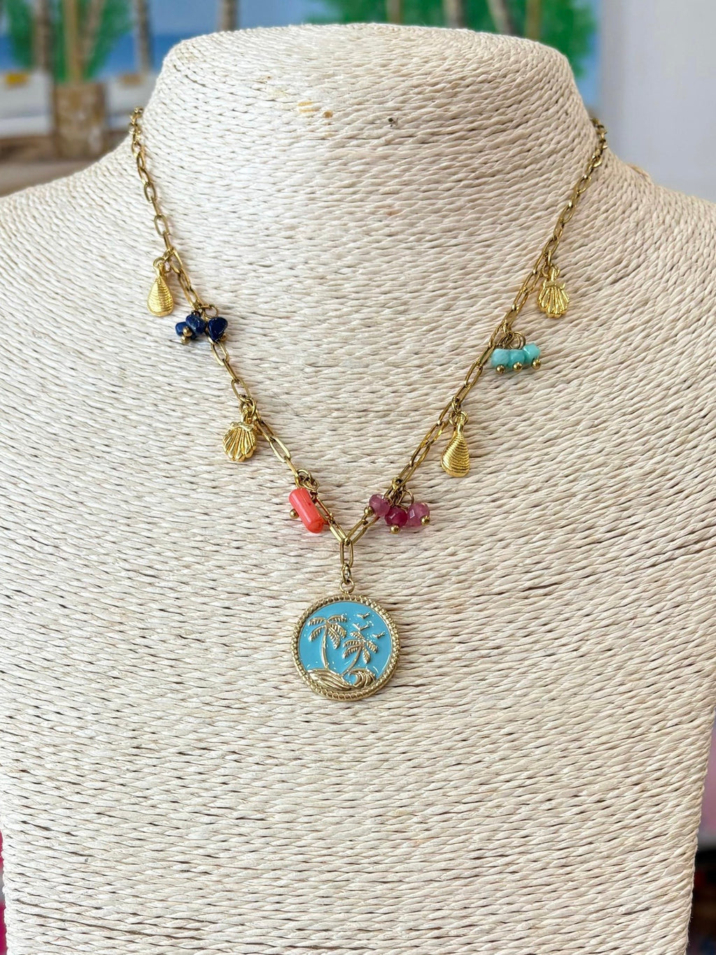 DELICATE CHAIN W/ ASSORTED CHARMS & TURQ PENDANT