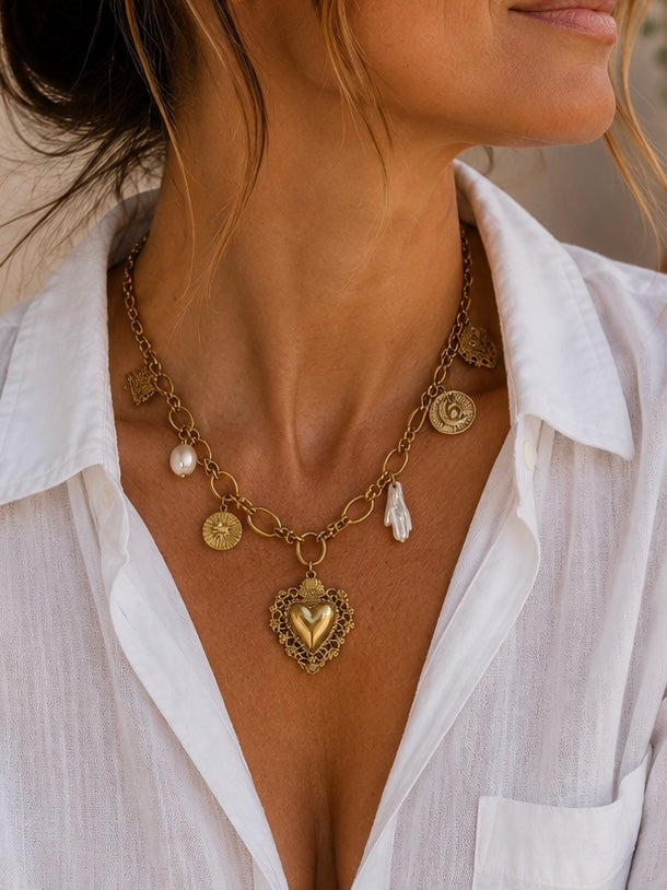 GOLD CHAIN W/ HEARTS PEARL SUN & STAR